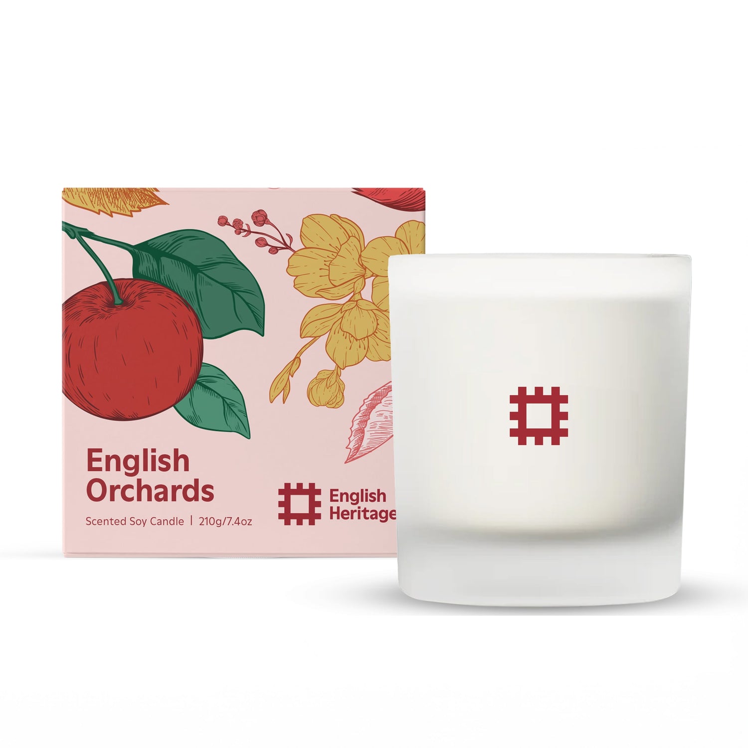 The English Heritage English Orchards apple scented candle by Home County Co. is shown next to its illustrated candle box.