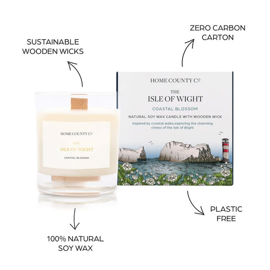 Sustainable candle credentials are shown around the coastal blossom scented candle image - sustainable wooden wicks, zero carbon carton, 100% natural soy wax, plastic free