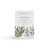 A seaweed and samphire scented natural soap bar from the Home County Co. is shown in its seaweed illustrated recyclable soap bar wrap