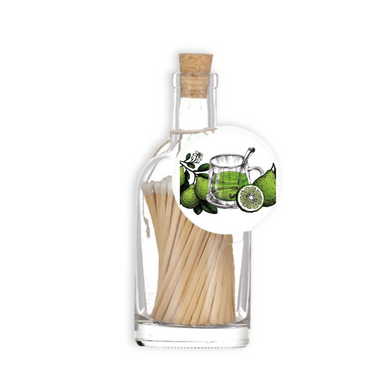 A luxury glass match bottle from the Home County Co. with Green Tea illustrated gift tag.
