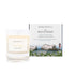 A coastal blossom scented soy wax candle inspired by the Isle of Wight is shown next to its sustainable candle box with coastal illustration
