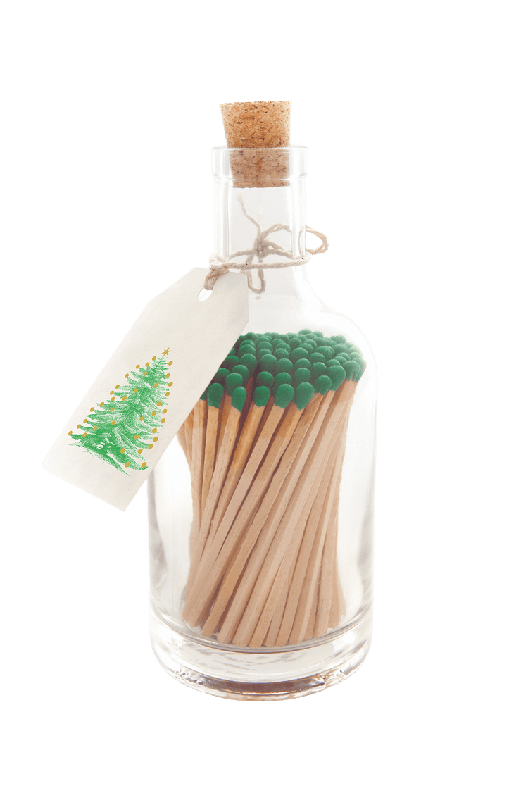 A bottle of Archivist long matches is shown in a bottle with Christmas tree gift tag