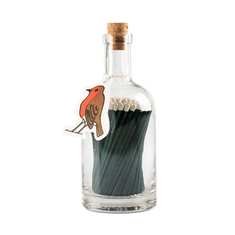 An Archivist bottle of green matches is shown with its robin redbreast gift tag