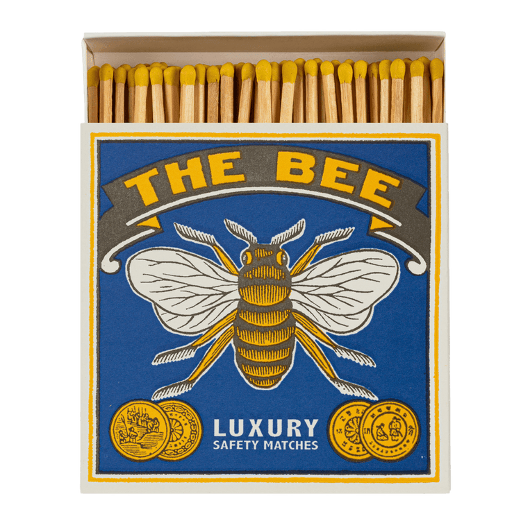 A box of Archivist matches featuring The Bee design are shown open with 125 yellow tipped long matchsticks inside