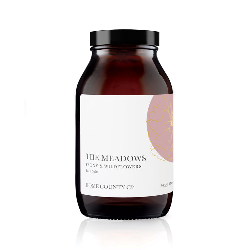 A 500g amber jar of dead sea bath salts scented with Peony and Wildflowers.