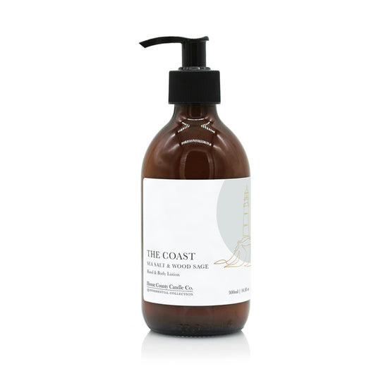 A 300ml coastal sea salt and wood sage hand and body lotion from the Home County Co. is shown in its eco-friendly amber glass bottle
