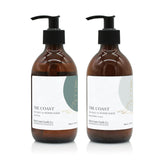 A 300ml coastal sea salt and wood sage scented hand wash and lotion duo from the Home County Co. is shown in eco-friendly amber glass bottles