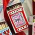 A mini matchbox, hand-painted by Eleanor Joanna with a love letters Valentine&