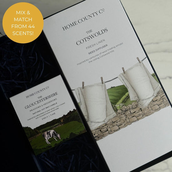 Home County Co. Candle and Diffuser gift set is shown with a Cotswolds Diffuser and Gloucestershire candle in a luxury navy gift box.