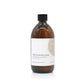 A 500ml woody cedarwood and jasmine scented hand and body lotion from the Home County Co. is shown in its eco-friendly amber glass bottle