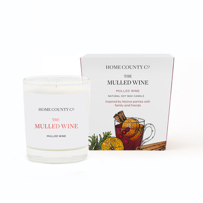 A Mulled Wine votive Christmas candle from the Home County Co. is shown in eco-friendly packaging