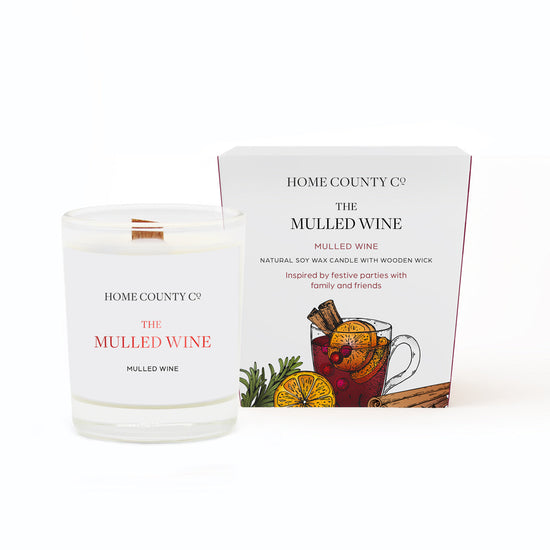 A Mulled Wine votive Christmas candle from the Home County Co. is shown in eco-friendly packaging