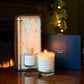 A Home County Co. Candle and Reed Diffuser Gift Set is shown in front of an open fire with the luxury navy gift box