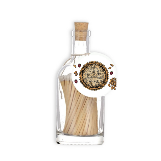 A luxury glass match bottle from the Home County Co. with Bakewell Tart  illustrated gift tag.