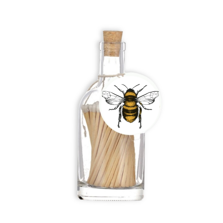 A luxury glass match bottle from the Home County Co. with bee illustrated gift tag.