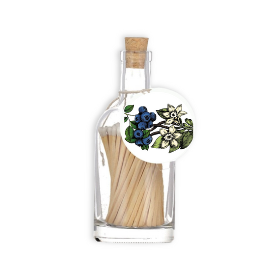 A luxury glass match bottle from the Home County Co. with blackcurrant illustrated gift tag.