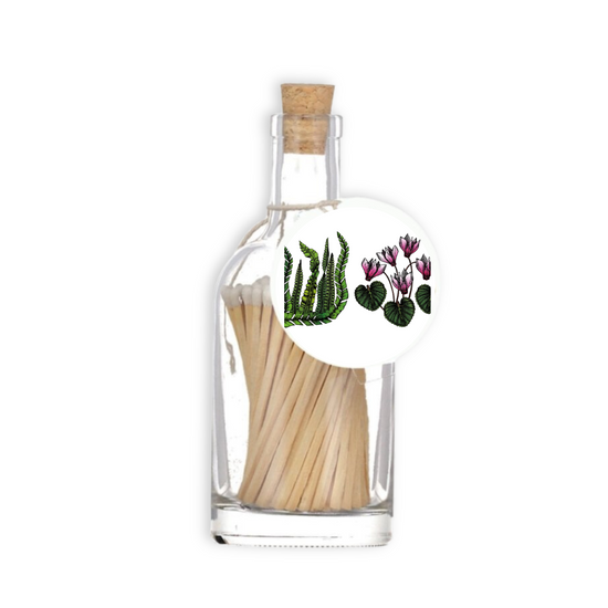 A luxury glass match bottle from the Home County Co. with Coastal Flowers illustrated gift tag.