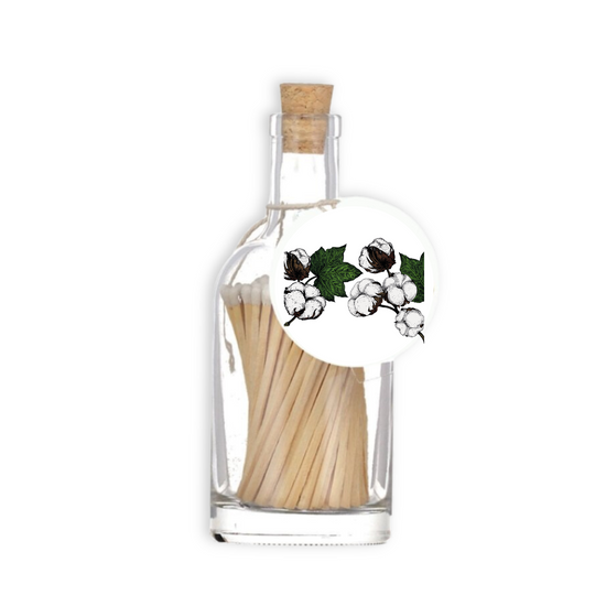 A luxury glass match bottle from the Home County Co. with cotton illustrated gift tag.