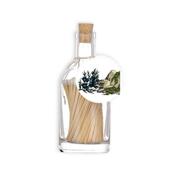 A luxury glass match bottle from the Home County Co. with Jurassic coast illustrated gift tag.