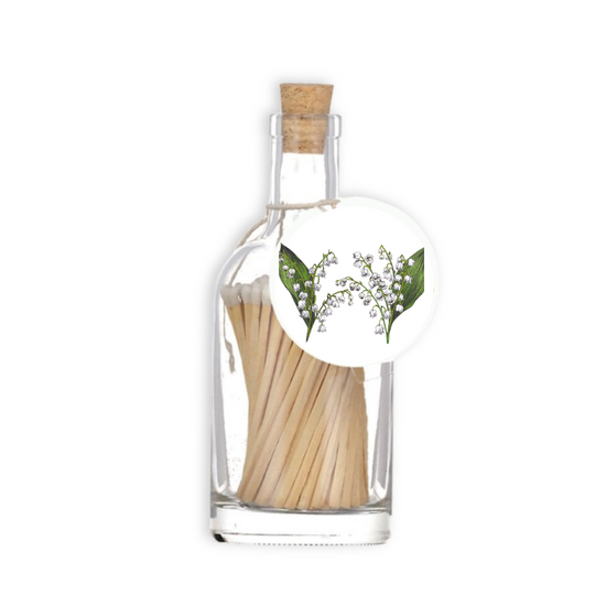 A luxury glass match bottle from the Home County Co. with Lily of the Valley illustrated gift tag.