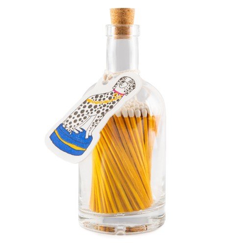 A luxury bottle of yellow matches from the Home County Co. with a dalmatian design tag