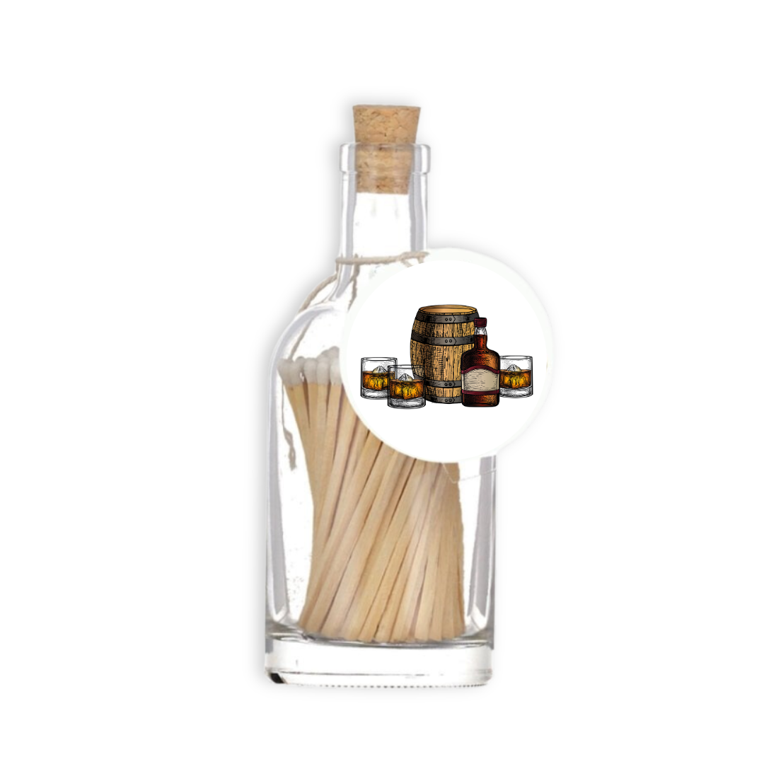 A luxury glass match bottle from the Home County Co. with scotch whisky illustrated gift tag.