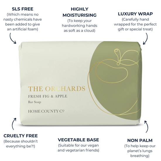 An apple scented soap bar from the Home County Co. is shown in a gold foil wrap with sustainable soap bar features. SLS free soap bar, cruelty free soap bar, vegan friendly soap bar, non palm soap bar.