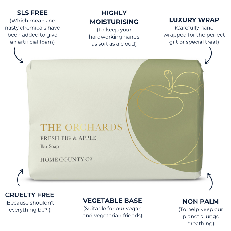 An apple scented soap bar from the Home County Co. is shown in a gold foil wrap with sustainable soap bar features. SLS free soap bar, cruelty free soap bar, vegan friendly soap bar, non palm soap bar.