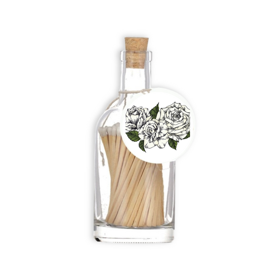 A luxury glass match bottle from the Home County Co. with White Roses illustrated gift tag.