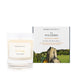 An oakmoss and amber scented soy wax candle inspired by Wiltshire is shown next to its sustainable candle box with stonehenge illustration