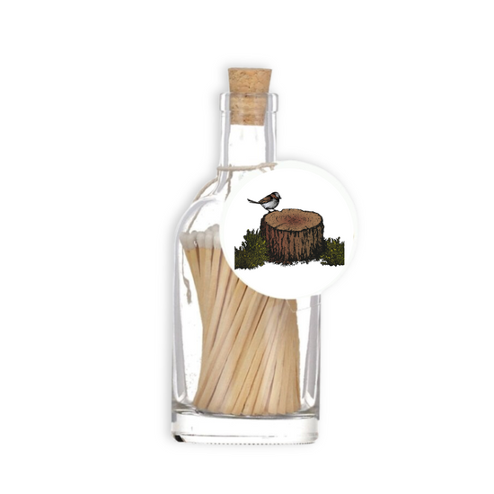 A luxury glass match bottle from the Home County Co. with woodland bird illustrated gift tag.