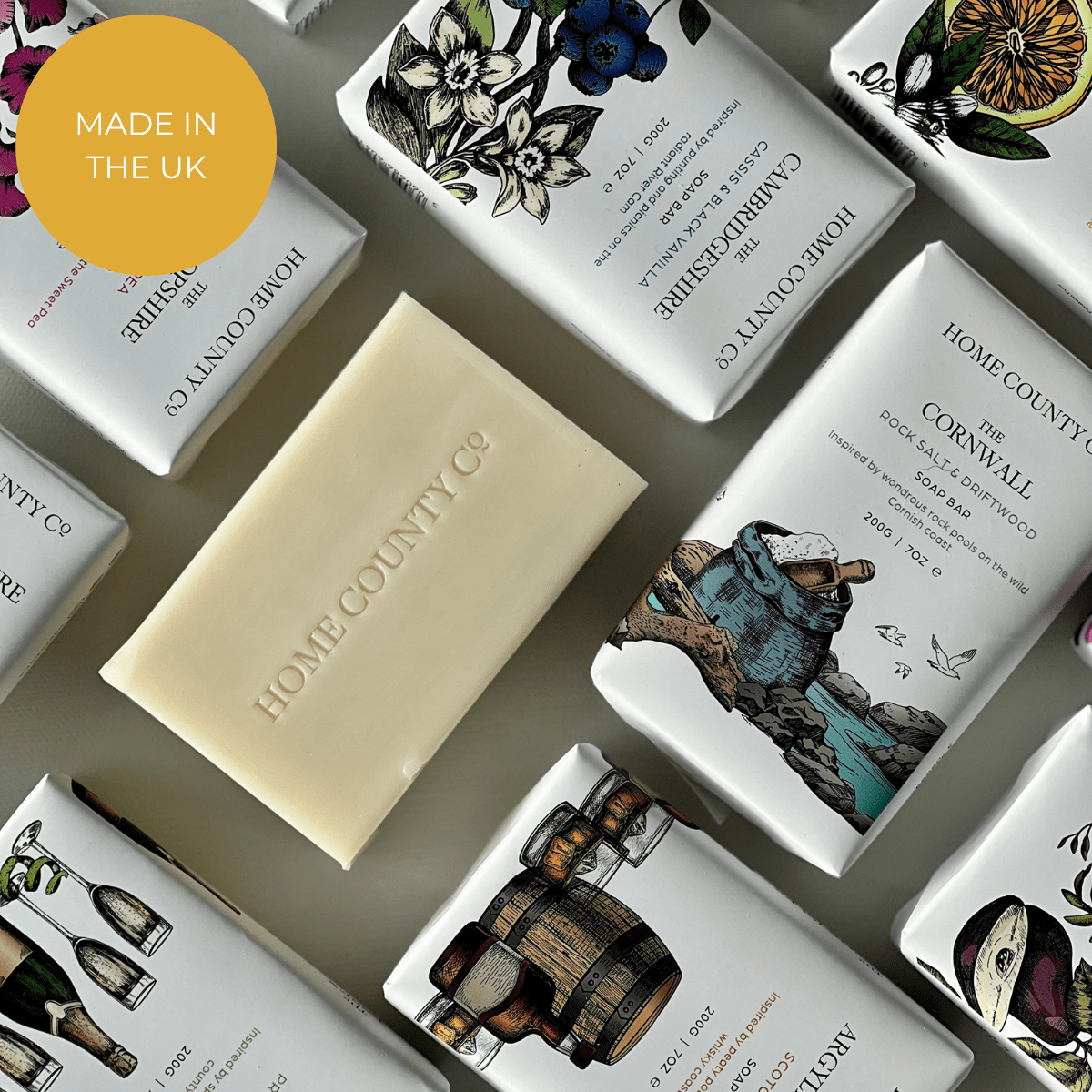 Home County Co. county soap bars shown in a flatlay with Made in the UK callout