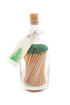 A bottle of Archivist long matches is shown in a bottle with Christmas tree gift tag
