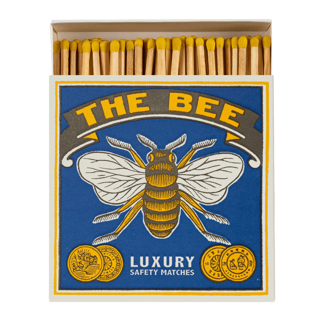 A box of Archivist matches featuring The Bee design are shown open with 125 yellow tipped long matchsticks inside
