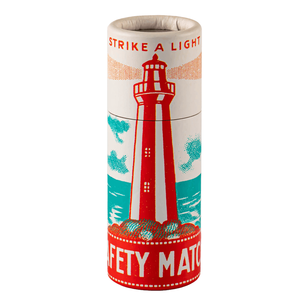 A cylinder box of Archivist matches with nautical lighthouse design and strike a light message
