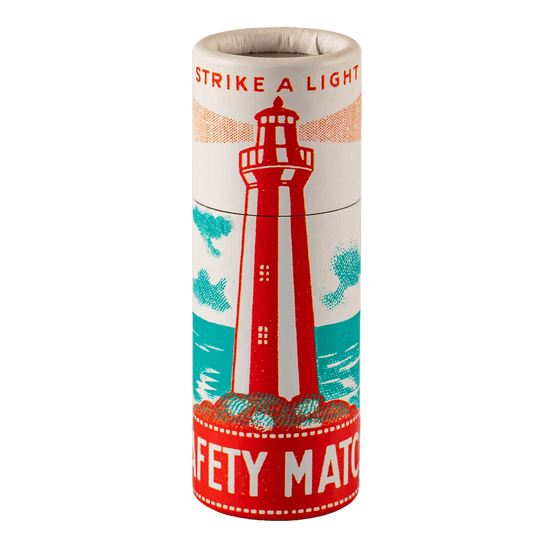 A cylinder box of Archivist matches with nautical lighthouse design and strike a light message