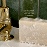 Home County Co. soap bar is shown on a sink with naturally foaming bubbles from the SLS and Paraben Free soap bar
