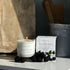 Candle and packaging labelled &