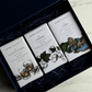 Home County Co. Trio of Soaps gift set shows 3 county-inspired soap bars in a luxury navy gift box with navy shredded paper