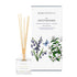 A woodland bluebell and jasmine scented reed diffuser from Home County Co. The vegan friendly reed diffuser is shown next to the eco friendly reed diffuser box packaging.
