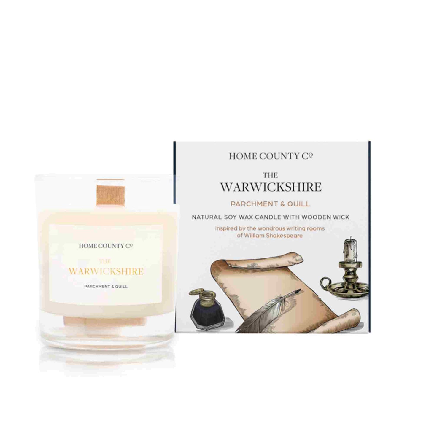 A parchment and quill scented candle from Home County Co. The wooden wick soy candle is shown next to the eco friendly box packaging.