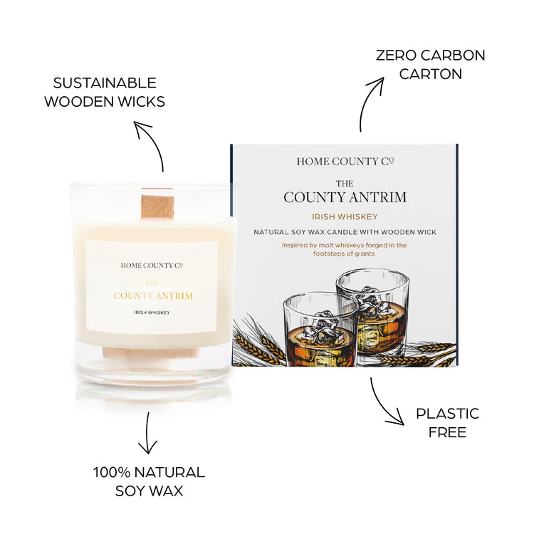 Sustainable candle credentials are shown around the whiskey scented candle image - sustainable wooden wicks, zero carbon carton, 100% natural soy wax, plastic free