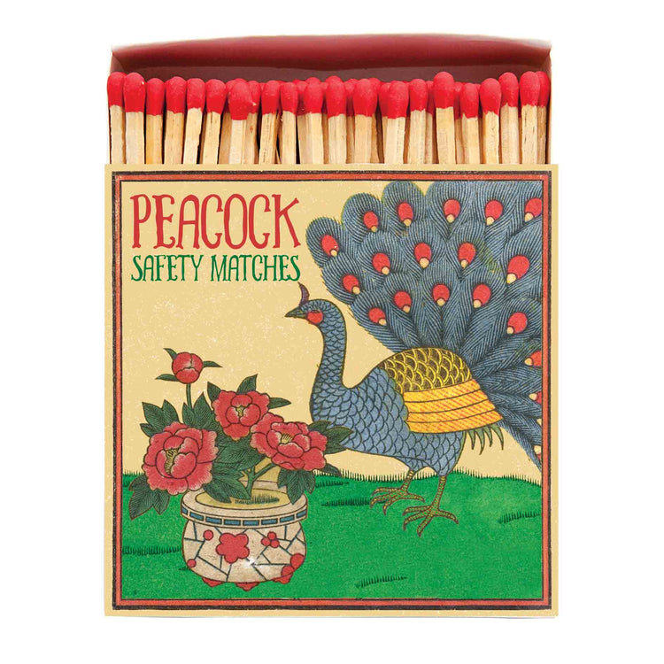 A box of luxury long matches from Archivist Gallery with peacock design