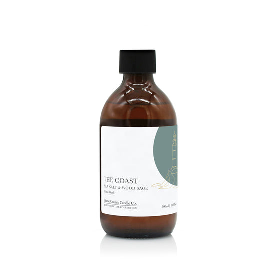 A 300ml coastal sea salt and wood sage liquid hand wash from the Home County Co. is shown in its eco-friendly amber glass bottle