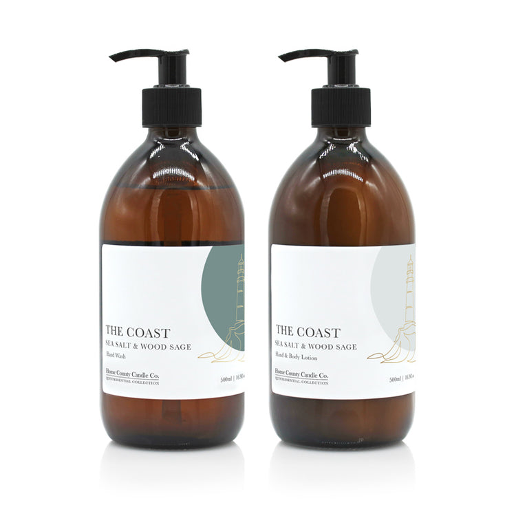 A 500ml coastal sea salt and wood sage scented hand wash and lotion duo from the Home County Co. is shown in eco-friendly amber glass bottles