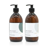 A 500ml coastal sea salt and wood sage scented hand wash and lotion duo from the Home County Co. is shown in eco-friendly amber glass bottles
