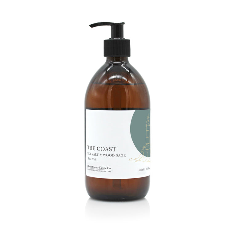 A 500ml coastal sea salt and wood sage liquid hand wash from the Home County Co. is shown in its eco-friendly amber glass bottle
