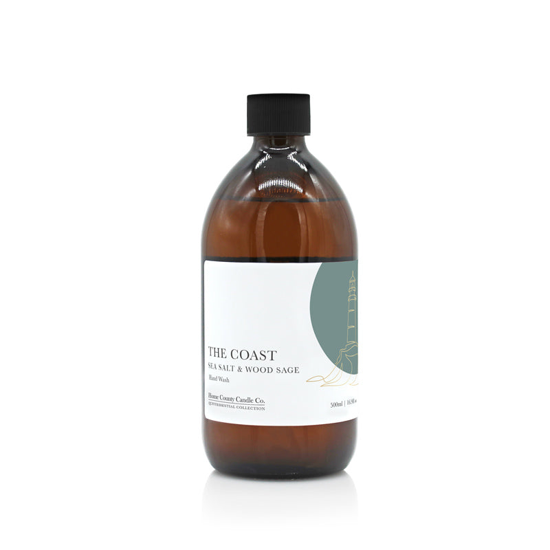 A 500ml coastal sea salt and wood sage liquid hand wash from the Home County Co. is shown in its eco-friendly amber glass bottle