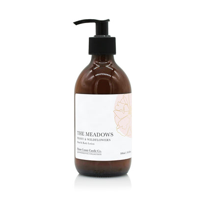 A 300ml floral peony and wildflowers scented hand and body lotion from the Home County Co. is shown in its eco-friendly amber glass bottle