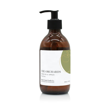 A 300ml fresh fig and apples scented liquid hand wash from the Home County Co. is shown in its eco-friendly amber glass bottle